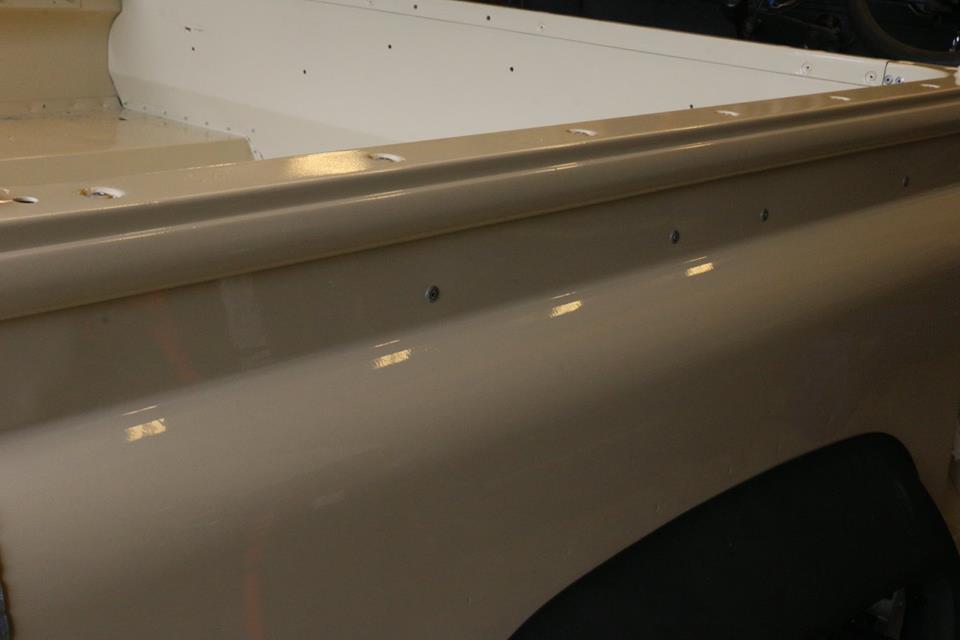 The cappings are installed and the rivets left exposed.