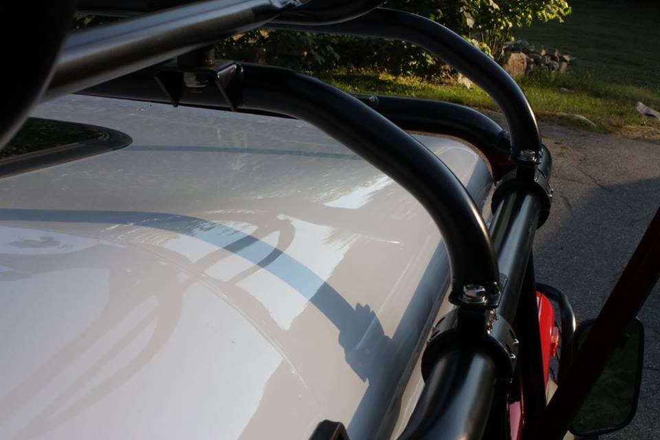 The roof was seam sealed with self leveling seam sealer and painted in Alpine White Glasurit. New roof rack mounts were fabricated to replace the broken originals.